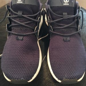 Navy and white adidas sneaker